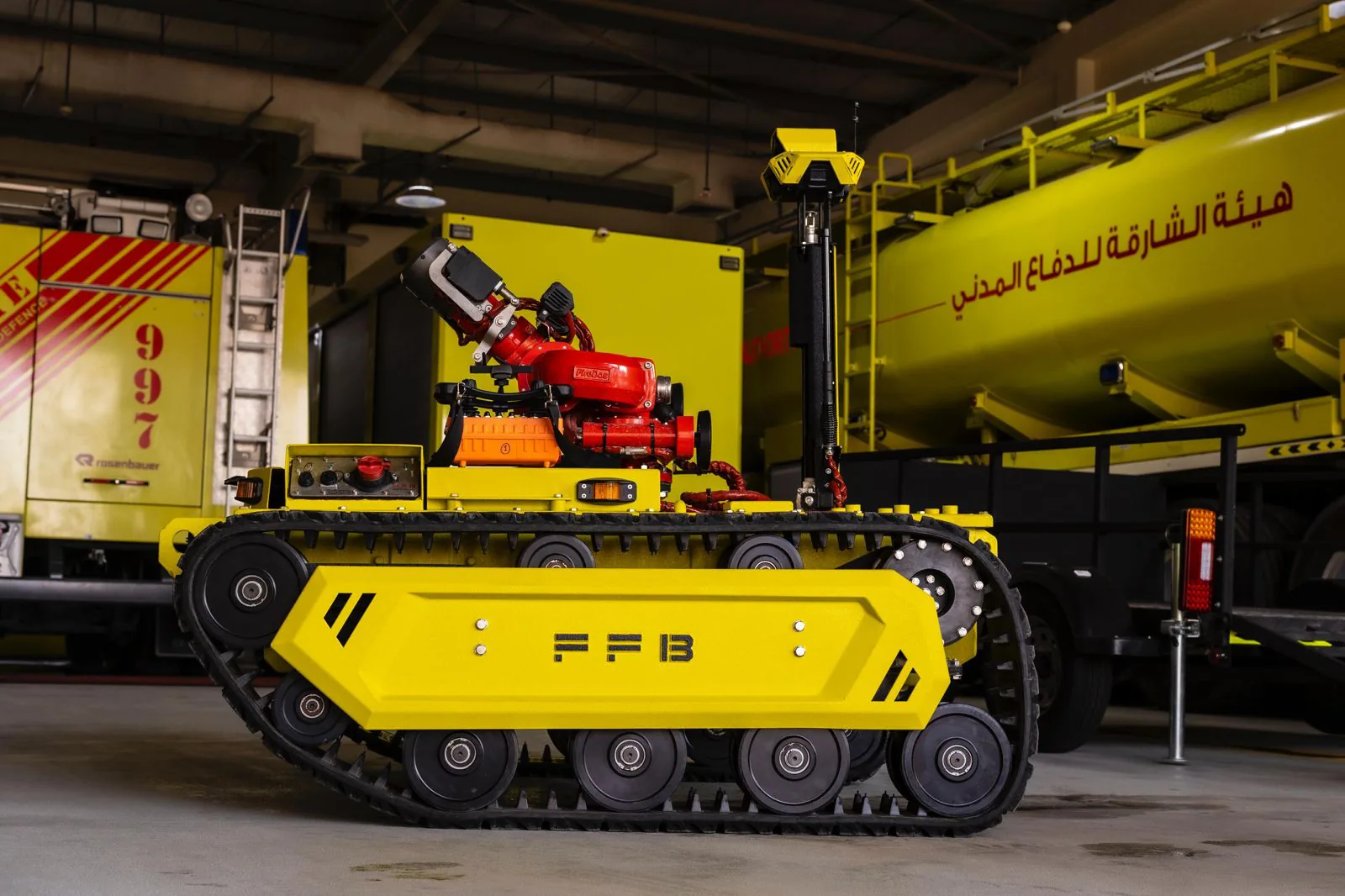 Robot with fire engines at a station